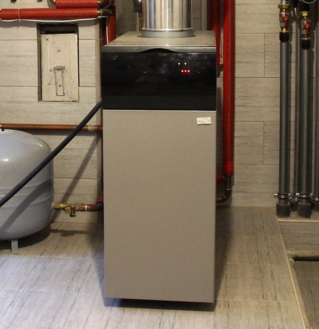 Residential boiler inside the room.