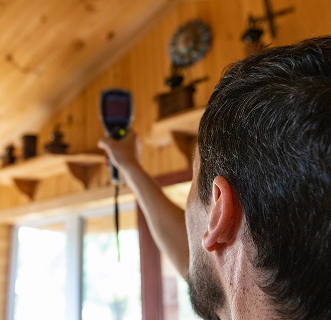 An asv technician taking infrared test.