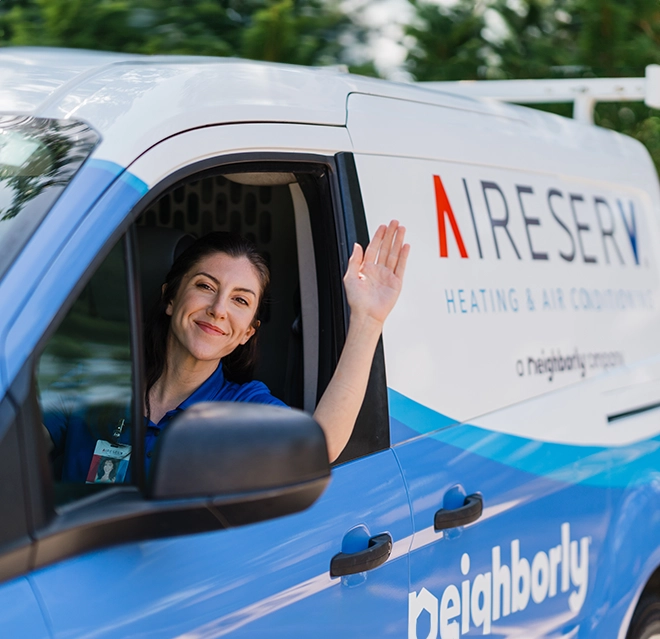 Aire Serv technician greeting from the van.