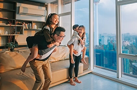 Family playing inside home.