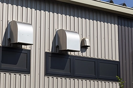 Ventilation system on exterior of business.