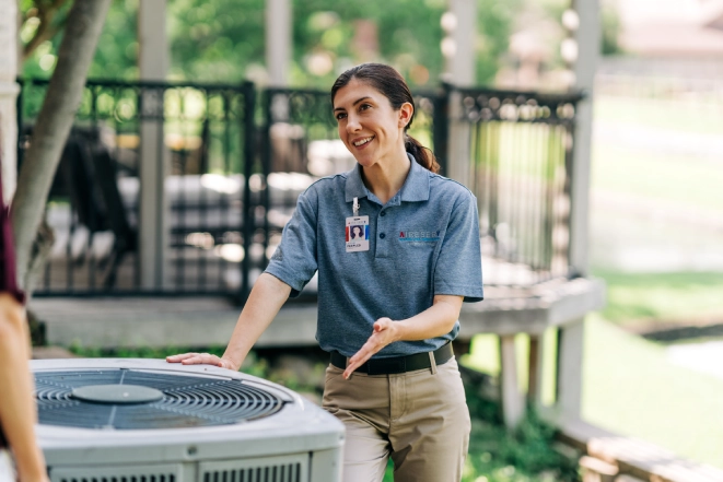 An ASV woman technician at work.