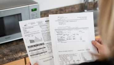 Woman assessing an energy bill