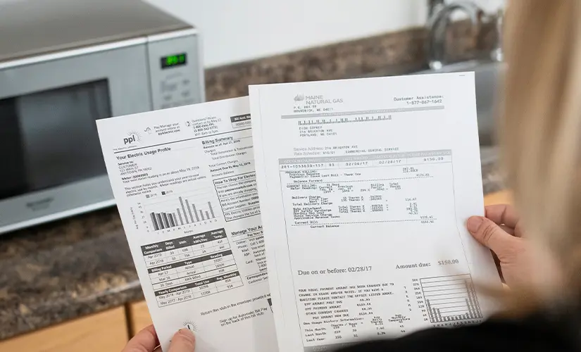 Woman assessing an energy bill
