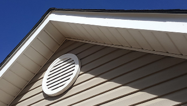 Vent in a house attic