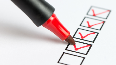 Check list with red pen