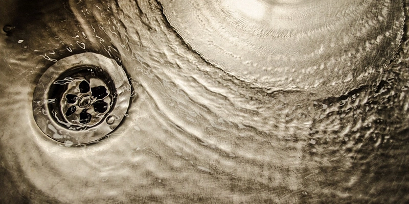 Water going down sink drain