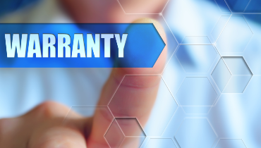Person touching screen with text: "warranty"