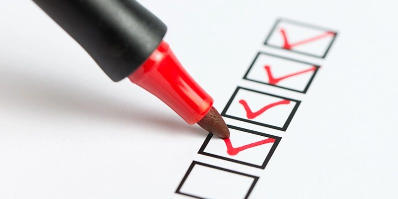 Check list with red pen